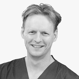 [Translate to Deutsch:] Portraitbild des Referenten in schwarz-weiß, Dr. Walter