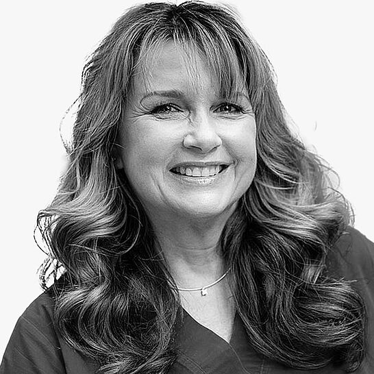 [Translate to Deutsch:] Portraitbild des Referenten in schwarz-weiß, Dr. John-Weißer