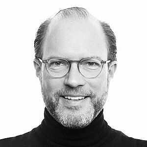 Fortbildung mit Referent Dr. Marquardt | Camlog Veranstaltungen Portraitbild des Referenten in schwarz-weiß, Dr. Marquardt