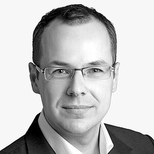 [Translate to Deutsch:] Portraitbild des Referenten in schwarz-weiß, Dr. med. dent. Stephan Jacoby