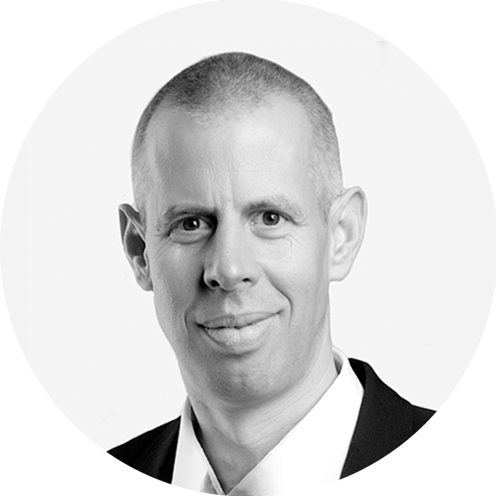 Portraitbild des Referenten in schwarz-weiß, Dr. Hammächer