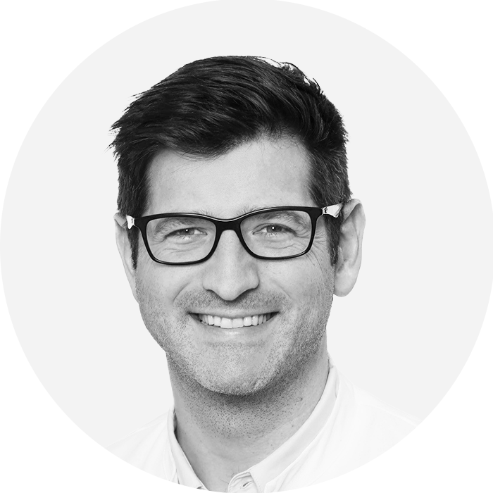 Portraitbild des Referenten in schwarz-weiß, Dr. Rothamel